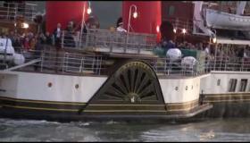 Passengers wave aboard the The Waverley as it sails back into Warrenpoint Port - 30th May 2023