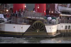 Passengers wave aboard the The Waverley as it sails back into Warrenpoint Port - 30th May 2023