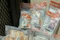 £1/4M AND DRUGS UNCOVERED IN NEWRY